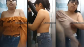 chavita calenturienta enseñando las tetas en el vestidor